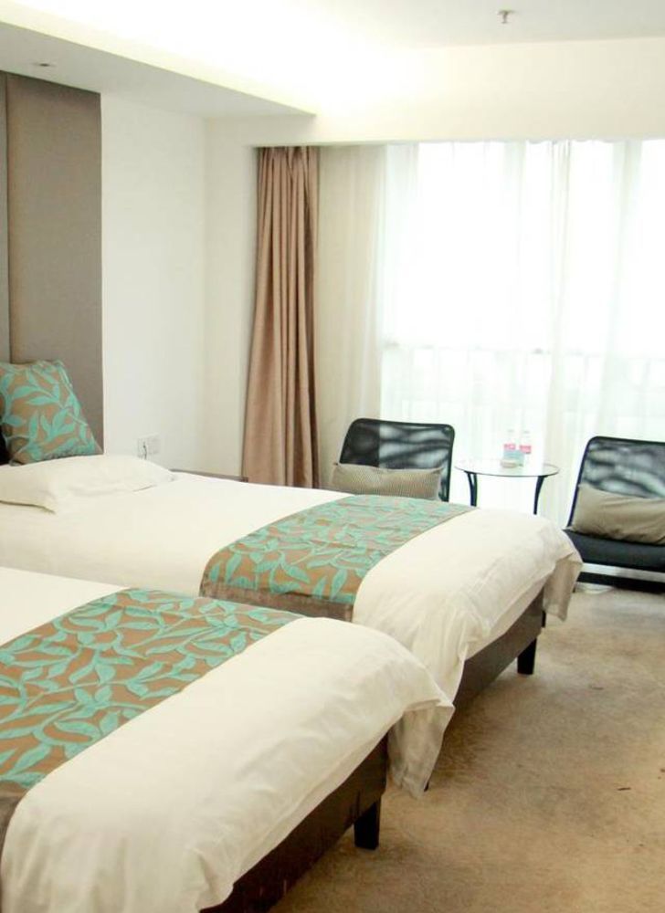 Coinfamily Hotel Xangai Exterior foto